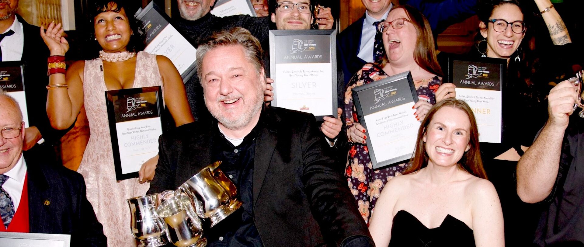 winners of the Guild of Beer Writers Awards 2021 including overall Beer Writer of the Year Pete Brown (centre)